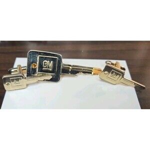 Gold Toned General Motors Rochester Products Men's Cufflinks With Tie Clip